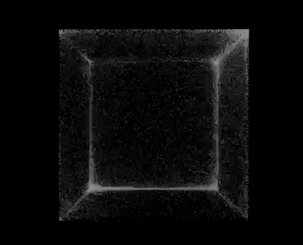 Early Fragment process sketch showing a luminous cube-like particle frame on a black background